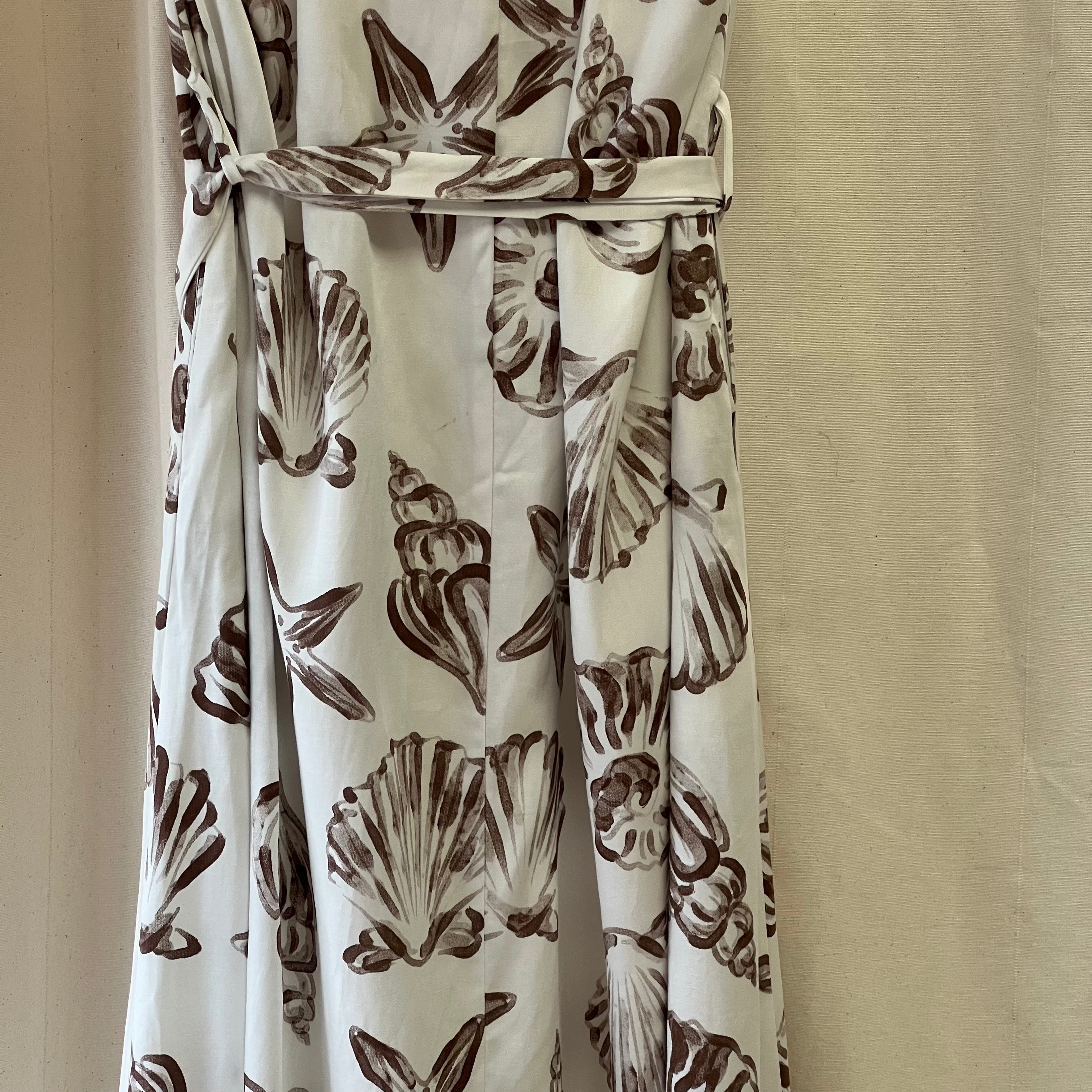 Michelle Keegan white with brown shell print halterneck dress with belt