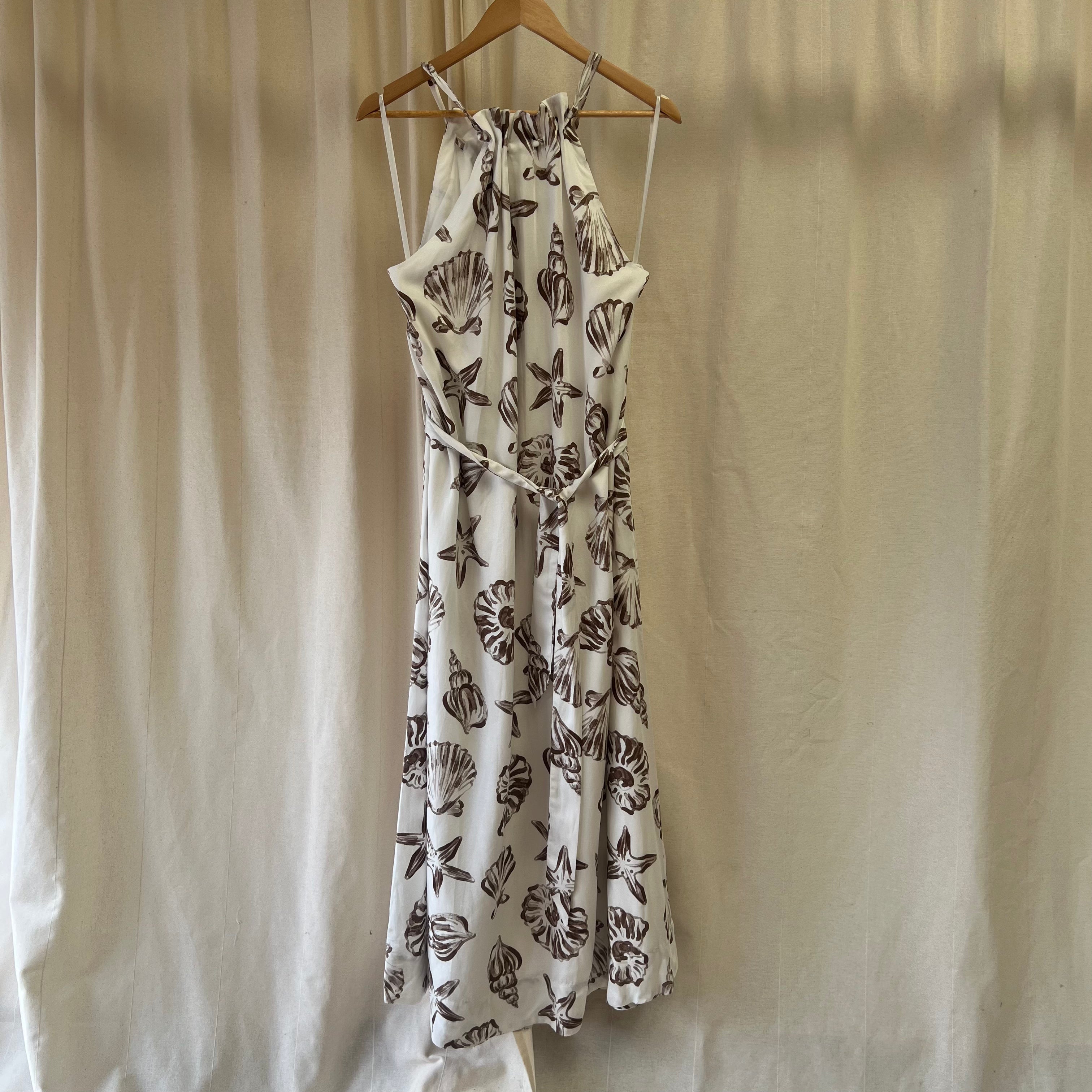 Michelle Keegan white with brown shell print halterneck dress with belt
