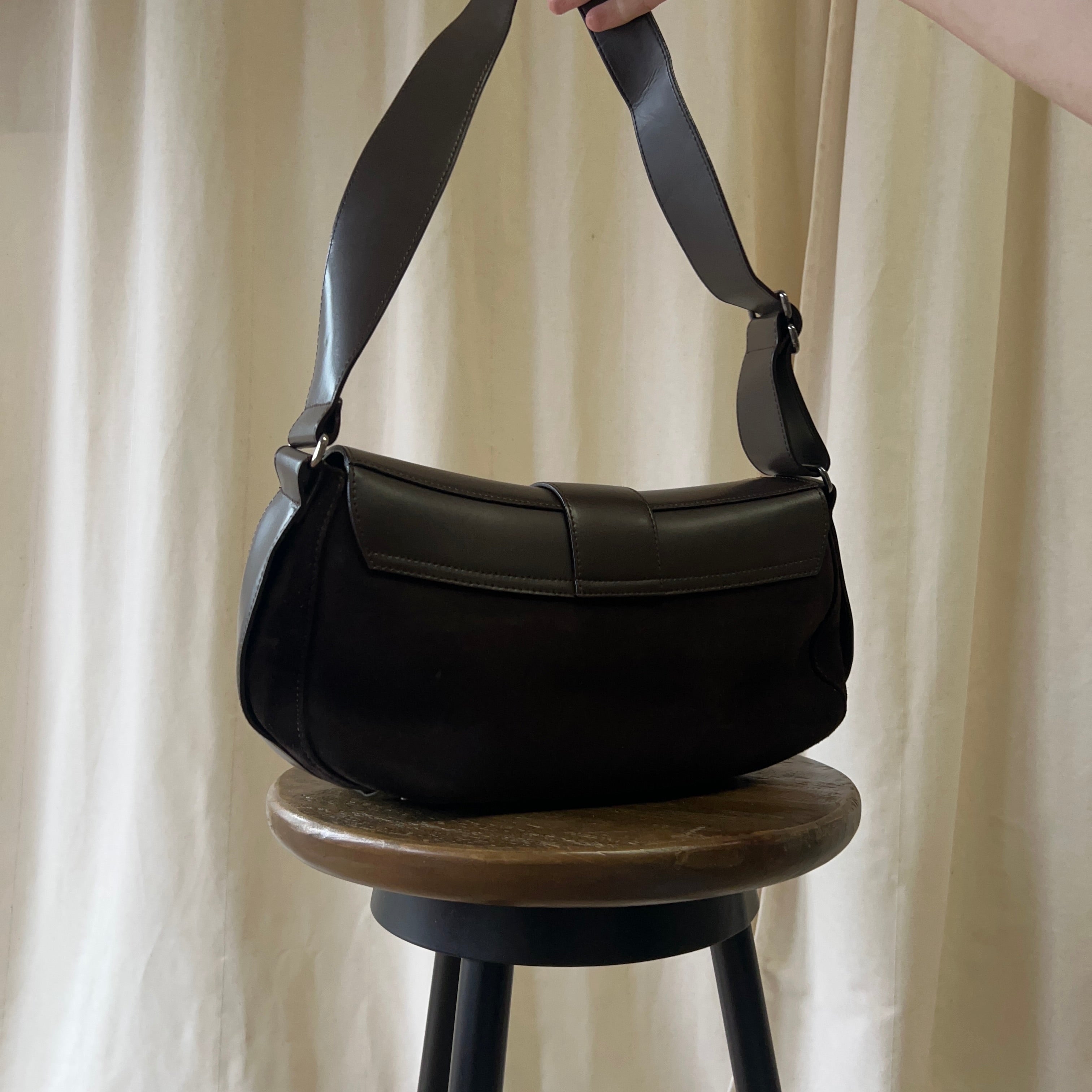 Russell and Bromley half saddle hand bag in brown suede