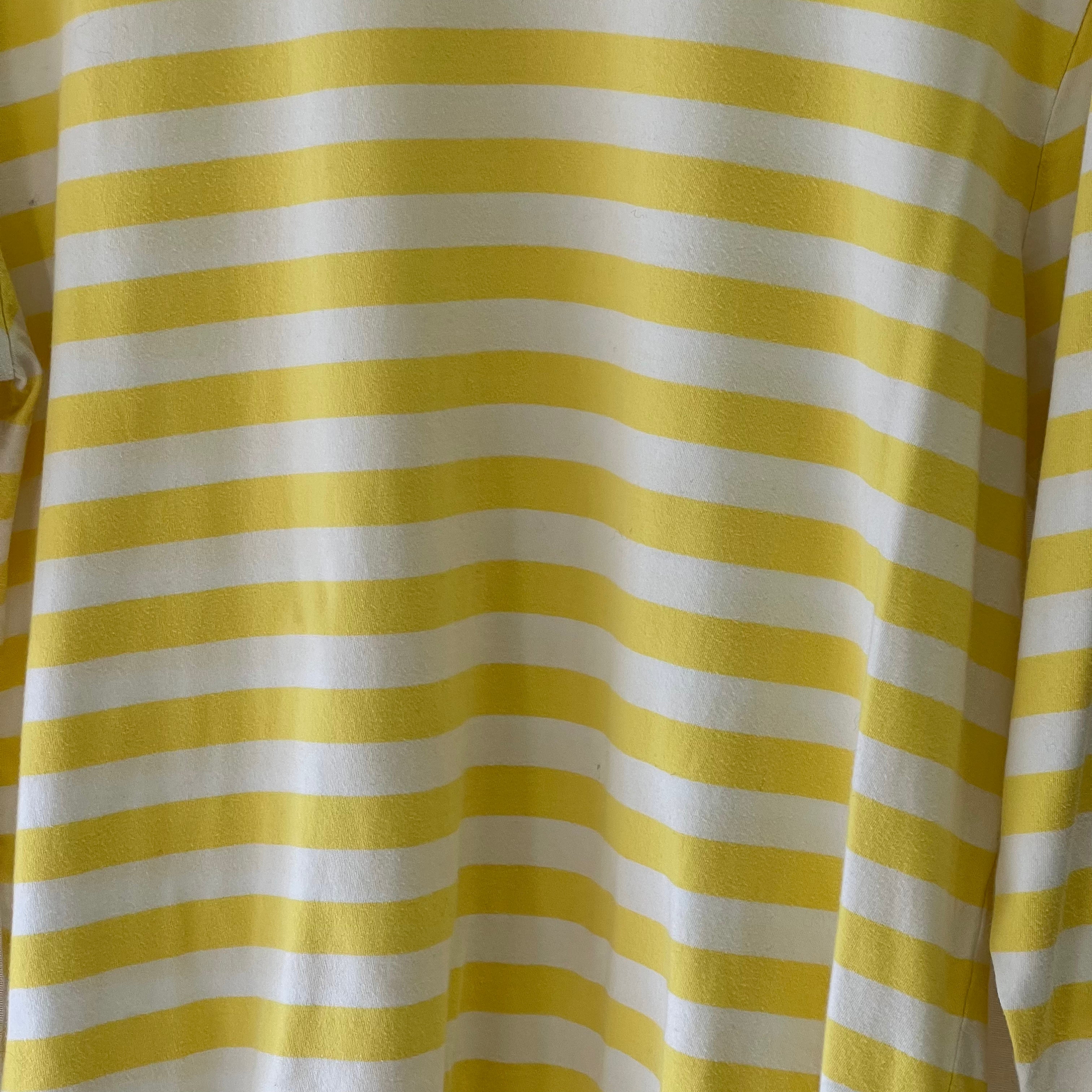 Close-up of yellow and white striped fabric